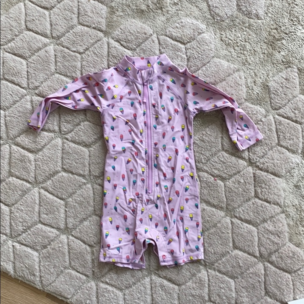 Egg baby rash guard body suit